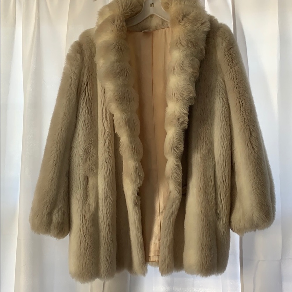 White and beige faux fur coat